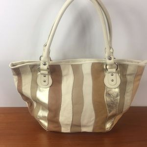 Tote with  strips of gold, cream, tan leather